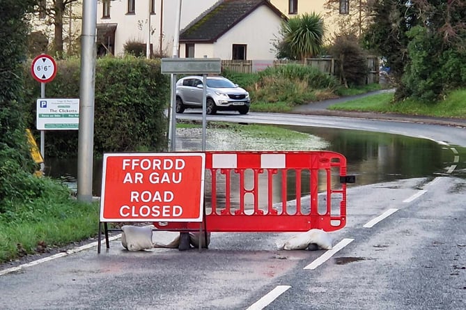 Clicketts Lane road closure woing to flooding