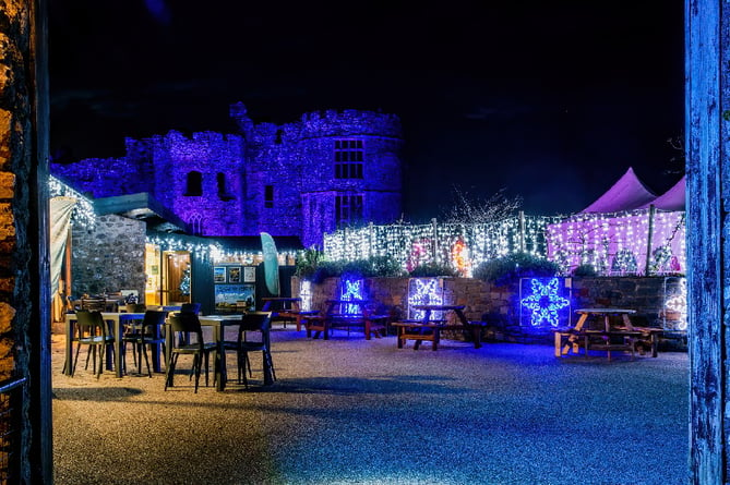 Carew Castle and Walled Garden illuminated for Christmas