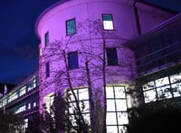 Haverfordwest's County Hall illuminated for Holocaust Memorial Day