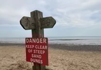Police investigate after body found on beach by Tenby