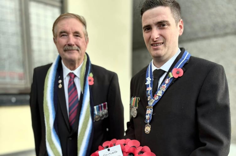 A wreath from Whitland and Narberth Round Table, one of many presented at Whitland Memorial Hall.