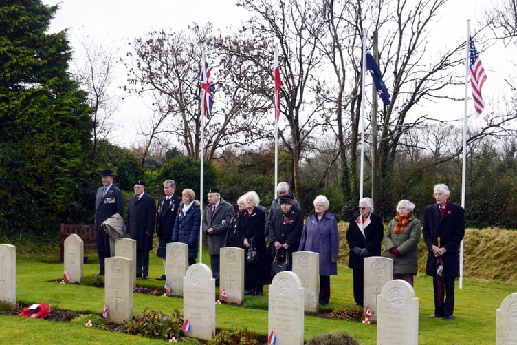 Members of the Cresselly and District Branch of The Royal British Legion paying their respects at the war graves plot at Carew Cheriton cemetery.
