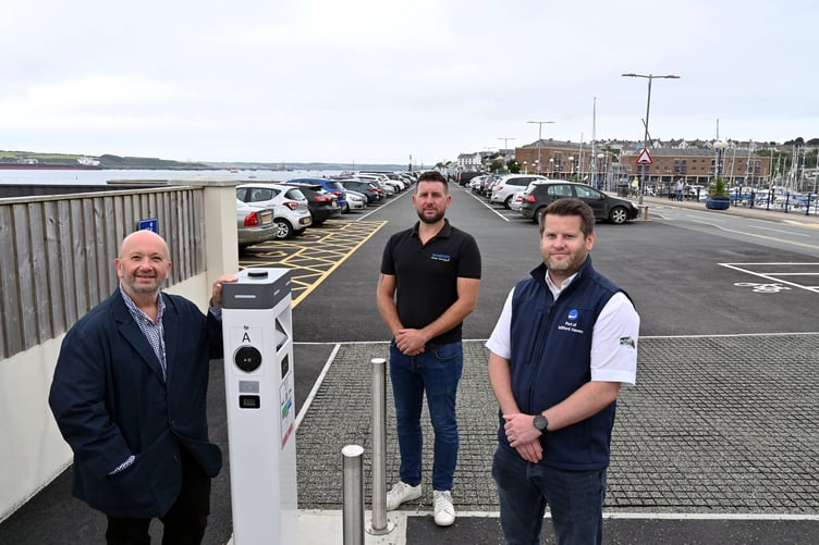 Councillor Rhys Sinnett, Andrew Mackay, and Gareth Phillips at the newly resurfaced Mackerel Quay car park