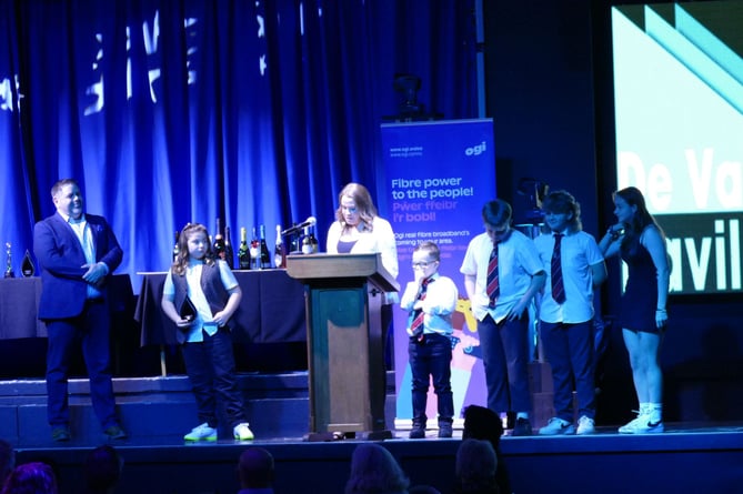 Young hero Samuel Fecci is seen second left alongside Tindle Wales & Borders Sales Director Paul Higman, award-presenter Sophie Toy and Tenby Swifts representatives.