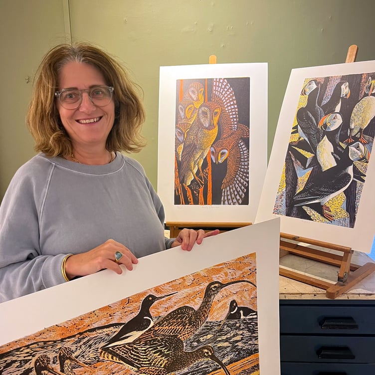 Emma Mason showcasing Osborne’s artwork in her gallery.