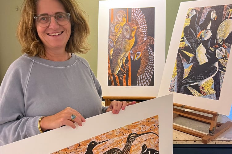 Emma Mason showcasing Osborne’s artwork in her gallery.