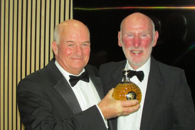 Winner Allan Morton with president John Stenson