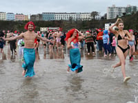 Watch as 100s take to the sea for Tenby's Boxing Day Charity Swim