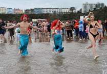 Watch as 100s take to the sea for Tenby's Boxing Day Charity Swim