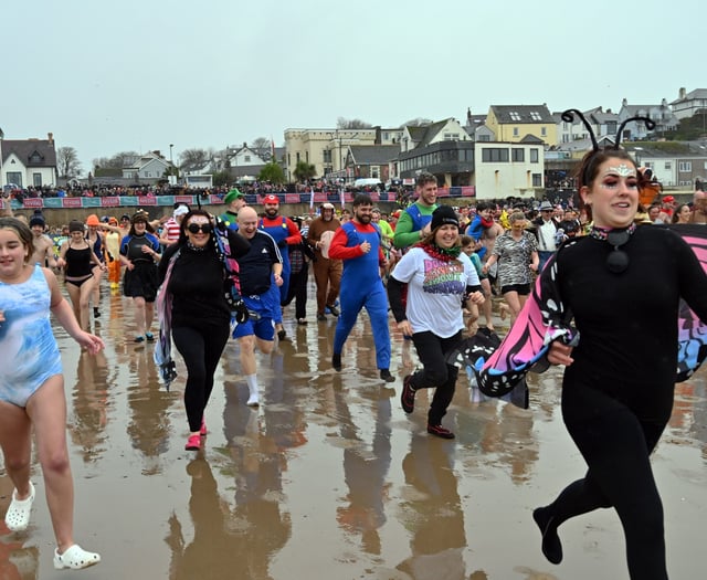 Thousands take to the sea in Saundersfoot for the New Year's Day Swim