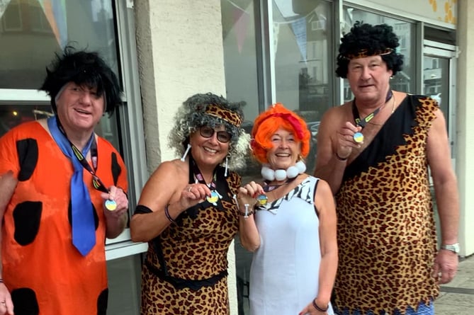 ‘Cavemen‘ Helen and Tony Hedley and friends in Saundersfoot, proudly displaying their NYDS medals.