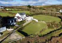 Coastal home for sale has its own paddocks plus "superb" views