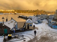WATCH: Snow falls on Tenby's picturesque harbour