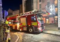 WATCH: Tenby firefighters tend to seafront building to make roof safe