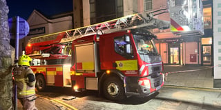 WATCH: Tenby firefighters tend to seafront building to make roof safe