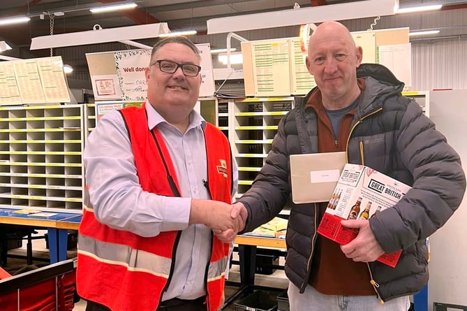 A presentation was made on Friday to Dorian Rees, who has just clocked up 40 years’ service as a postman working out of Narberth Sorting Office. (Pic. Malcolm Richards Photography)