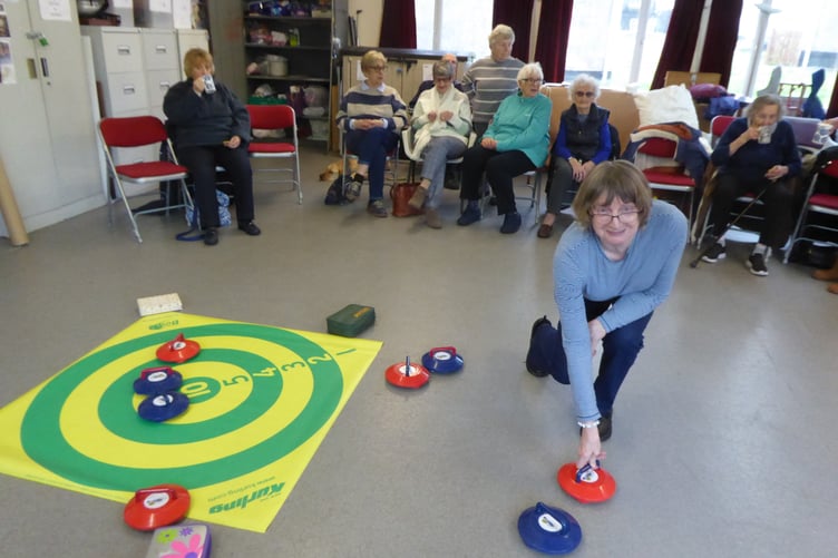 Kurling at Tenby Friendship Club on Wednesday, February 28 - Jeni with the stones.