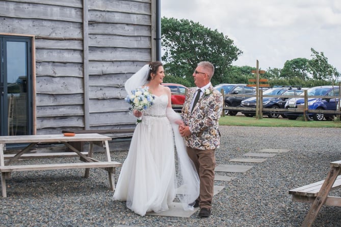 Bride and father of the bride, and a vintage car - at Lucy and Patrick Bellerby’s wedding at Rosemarket, Pembrokeshire