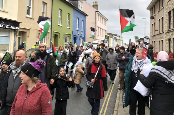 Pro-Palestine protestors previously marching to MP Stephen Crabb's office in Haverfordwest
