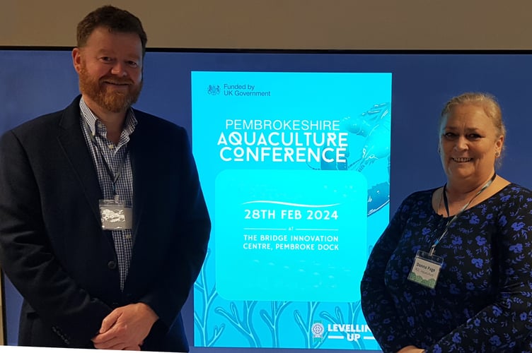 Jon and Donna at Aquaculture forum New one