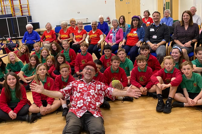 Children from Rhiwbeina Primary School with their visitors from the local Goldies Cymru session with Andy Roberts, Goldies session leader, out in front.