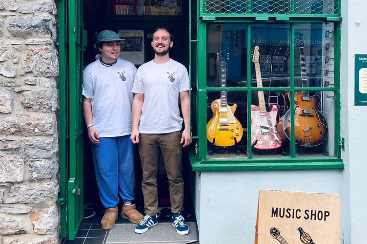 Tomas Newman and George Parfitt at Main Street Music in Pembroke