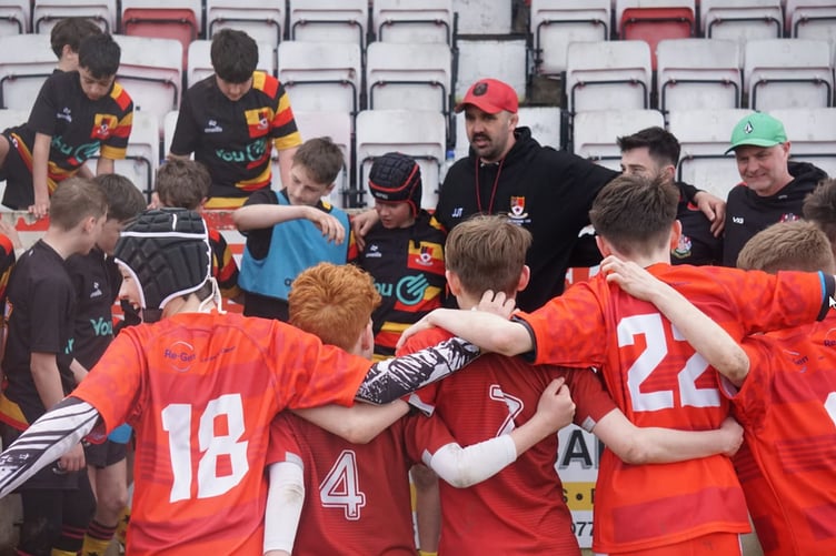 Former Welsh international Jonathan Thomas congratulating both teams on their performances after the match