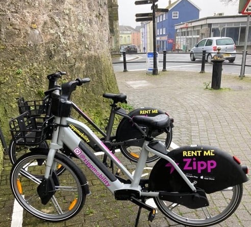Ebikes by Tenby town walls
