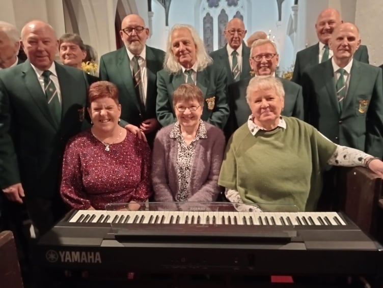 The Musical team of Alyson Griffiths, Carole Rees and Juliet Rossiter supported by choristers following the Pembroke and District Male Voice concert at Angle Church.