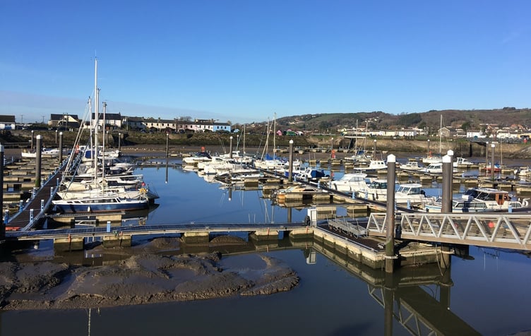 Boats at Burry Port harbour at low tide