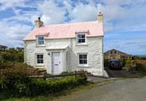 Look inside this cottage for sale full of period features and "superb" coastal views 