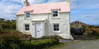 Look inside this pastel cottage for sale with "superb" coastal views 