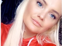 Investigation continues into death of woman found on beach