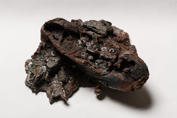 Abandoned Shoes. Cast Iron and mixed media