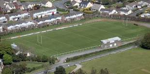 Police hunt teenage arsonists after rugby stand set on fire