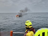 Tenby RNLI pull casualty from water after yacht goes up in flames
