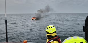 Tenby RNLI pull casualty from water after yacht goes up in flames
