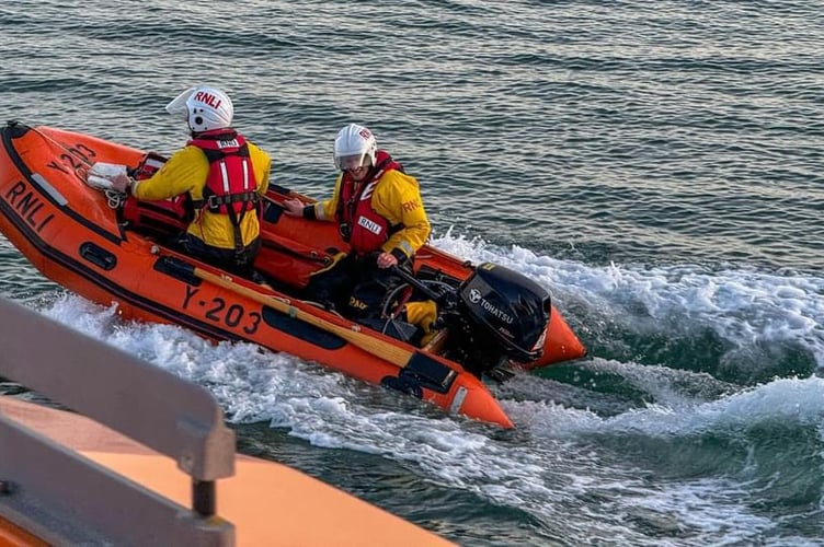 Angle lifeboat crew in action