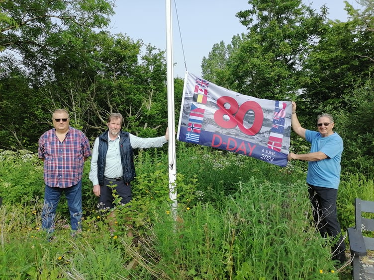 East Williamston Community Councillors Ian Wilkinson, Doug McIntosh and Dr Pete Strydom (chair) with the ‘D-Day 80 - Flag of Peace’