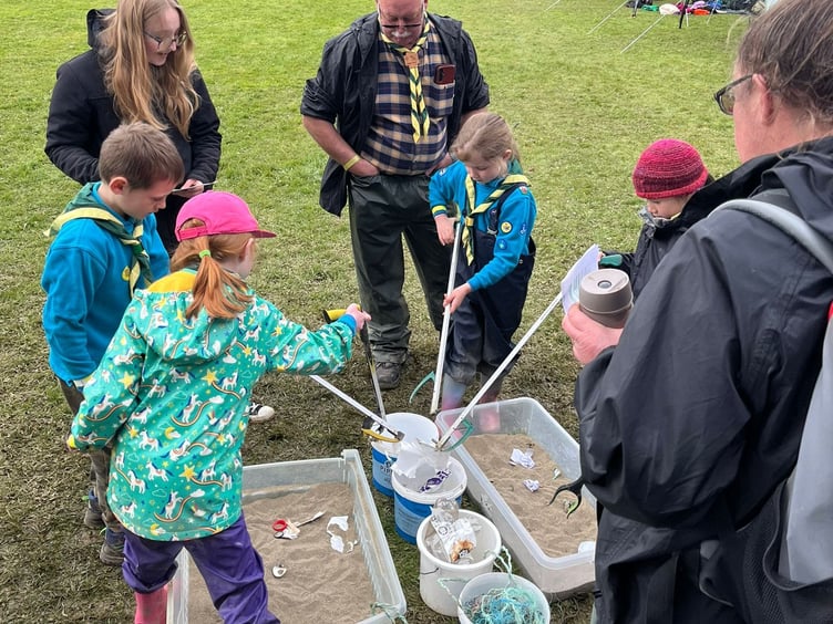 Litter picking race at Sea Trust Scouts event, Picton Castle