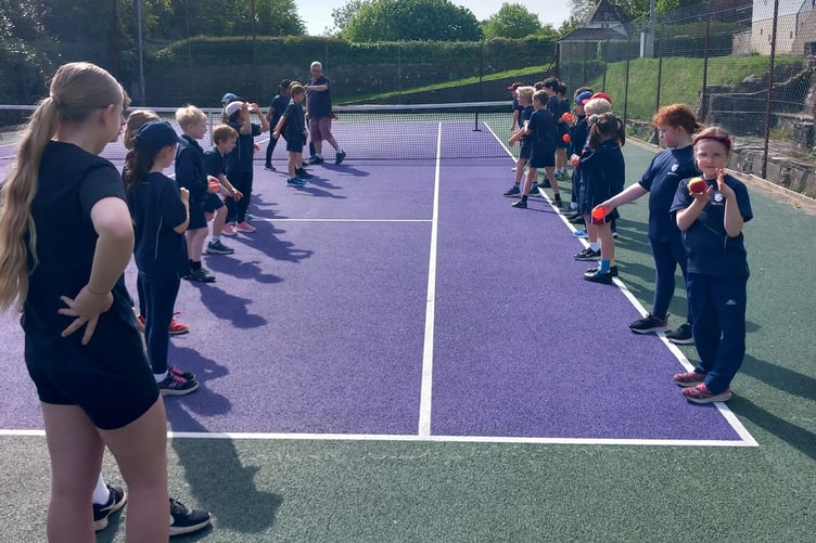 The youngsters give cricket a go