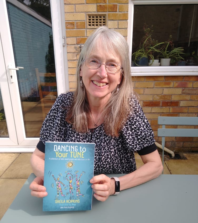 Sheila Hopkins with her new book, Dancing to Your Tune