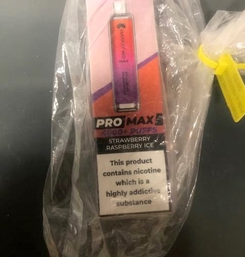 There was a large stock of illegal vapes on open display in the store.