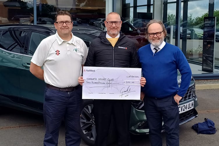 Huw Simpkins of Narberth Cricket Club receiving a £300 sponsorship cheque from Jason Boucher (sales manager) and Ian Gravell of Gravells, Narberth who have agreed to become Senior Cup Match Sponsors for the 2024 season