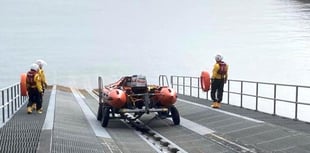 RNLI crew assist injured coasteerer