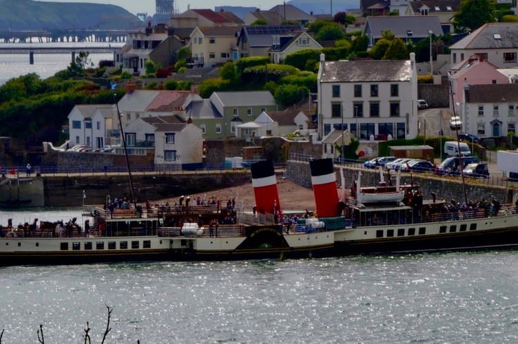 The Waverley entering Milford Docks with a backdrop of Hakin Point.