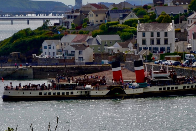 The Waverley entering Milford Docks with a backdrop of Hakin Point.