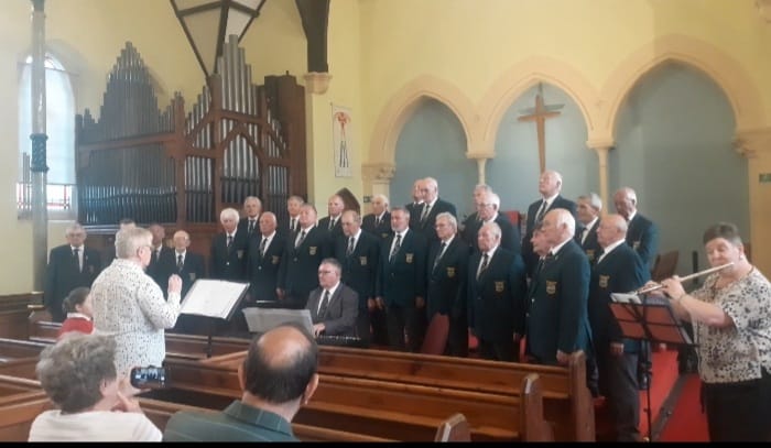 Pembroke and District Male Voice performing at St John’s Church, Tenby, with Musical Director Juliet Rossiter, Accompanist Peter Griffiths and Flautist Alyson Griffiths.