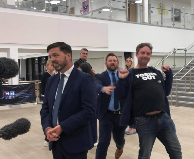 Conservative Stephen Crabb photobombed by ‘Tories out’ activist