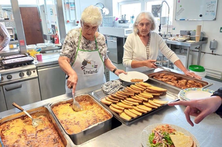 Every Tuesday at 12.30pm, the VC Gallery in Pembroke Dock has a shared lunch. Everyone is welcome and it’s free. Last Tuesday, new recruits Gloria and Liz stepped in to help make puddings and help serve up pasta bake, salad and garlic bread, apple pie or cake and custard to 65 people. Gloria said: “We enjoyed it, and were glad we could help.”